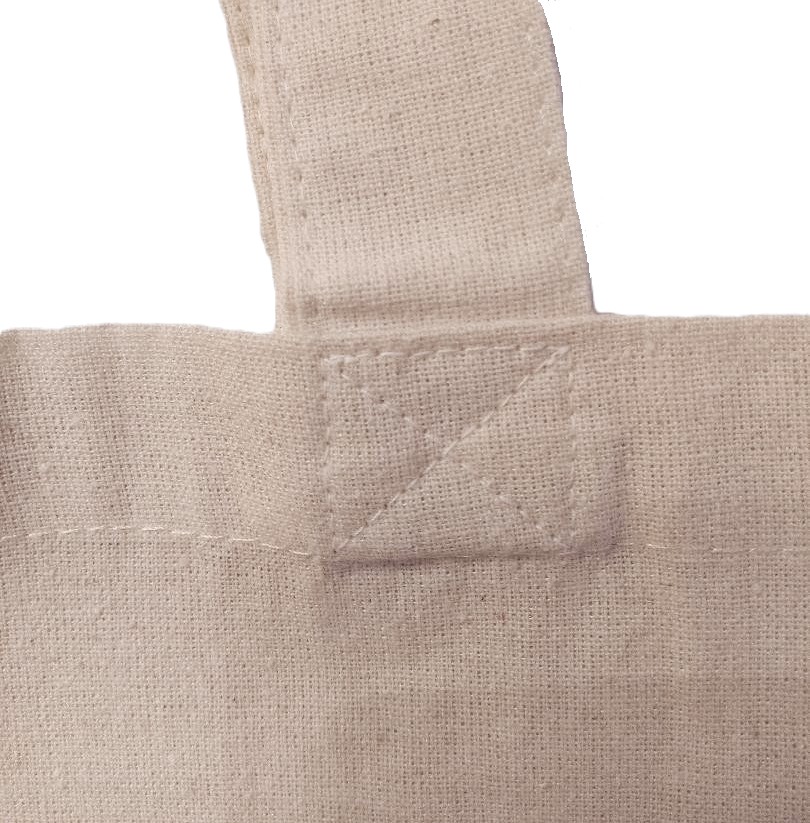 Photo of a tote canvas bag strong stitching.