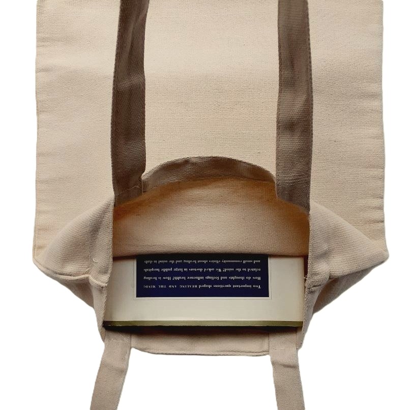 Photo of a canvas tote bag with wide open mouth for more spance inside.