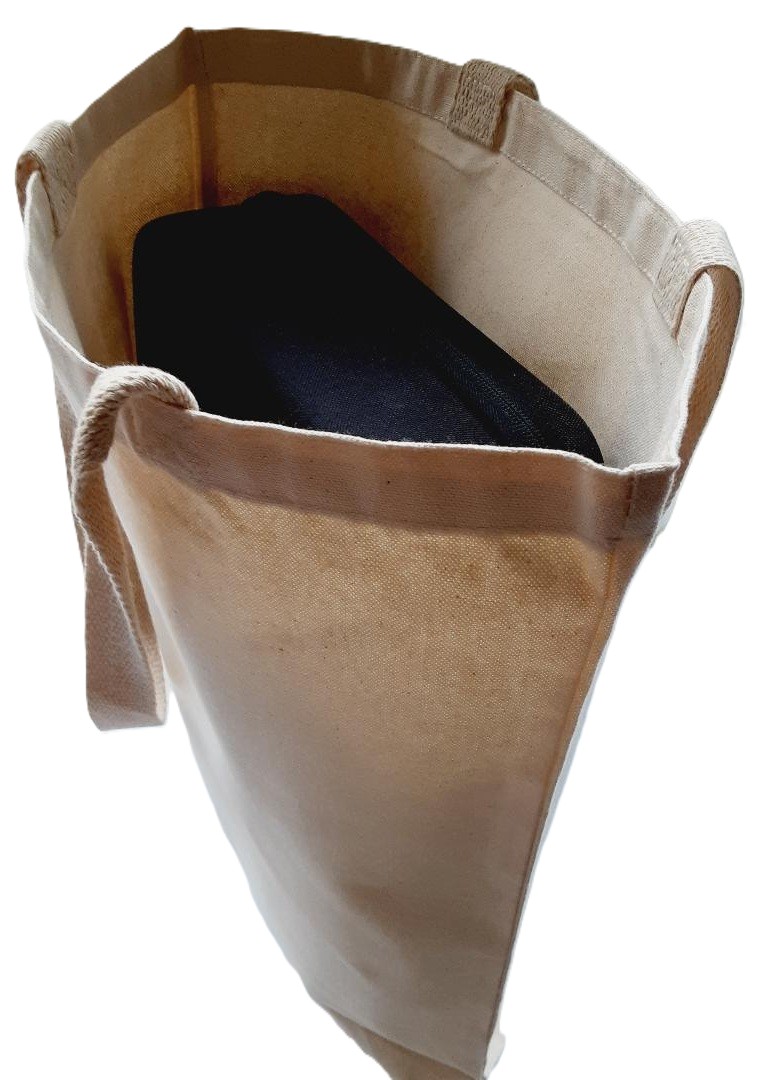 Photo of a canvas tote bag with wide open mouth.
